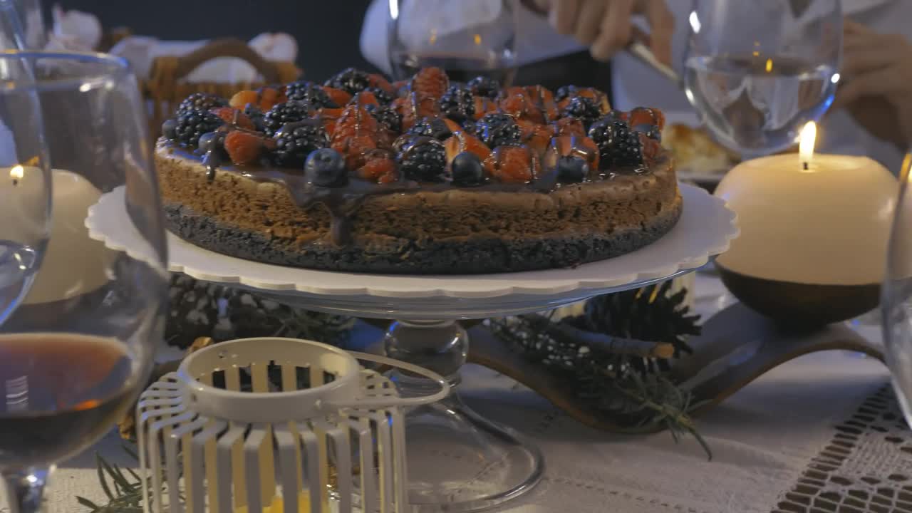 Stock Video Elegant Table With People Eating At Christmas Dinner Live Wallpaper For PC - Free Download