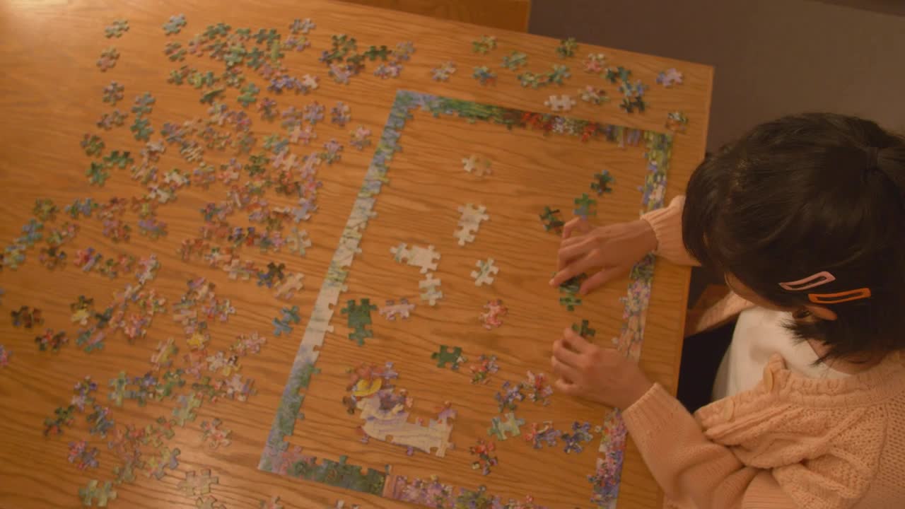 Free Stock Video Young Woman Putting Together A Puzzle Live Wallpaper - Free Download