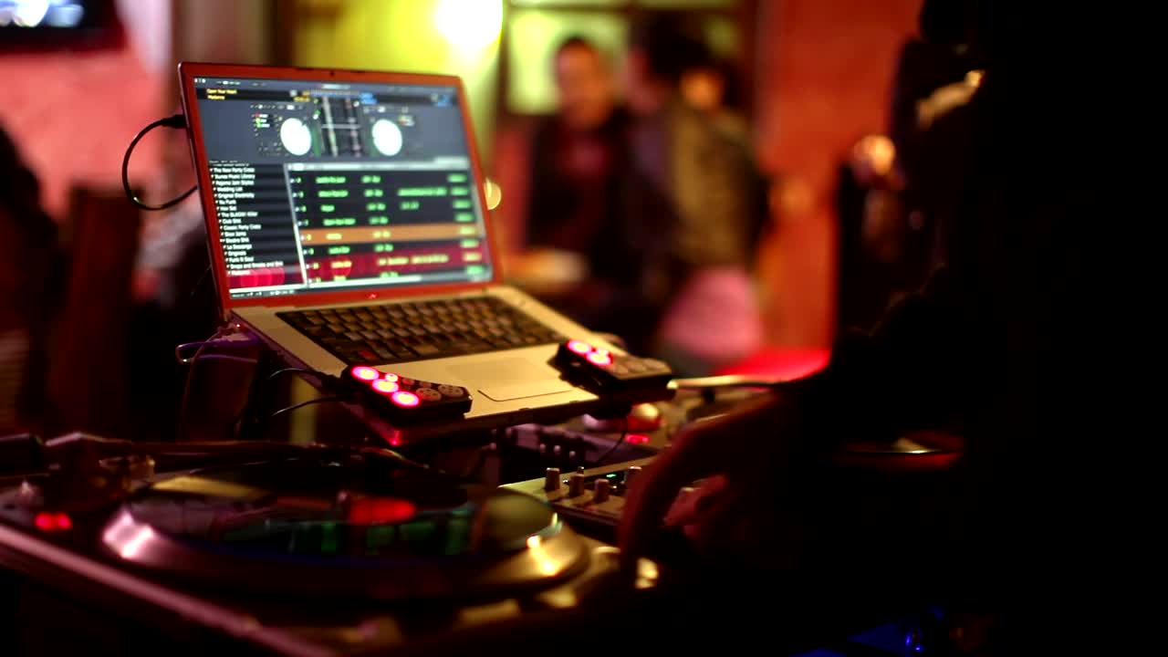 Stock Video Dj Behind The Turntables With A Computer Live Wallpaper For PC - Free Download