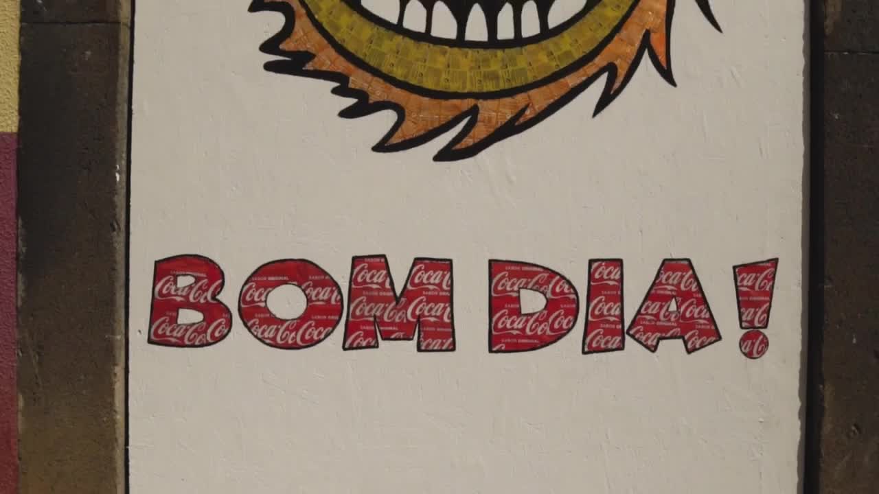 Stock Video Painted Sign On A Building With The Words Bom Dia Live Wallpaper - Free Download