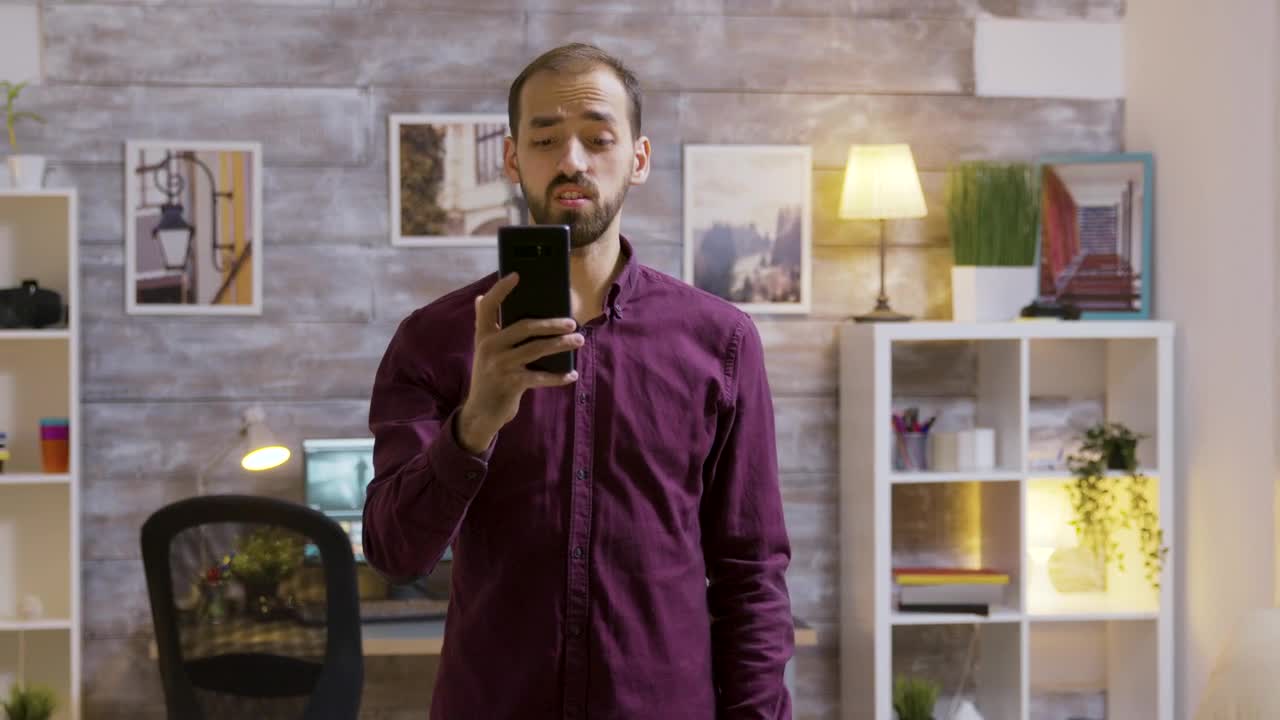 Stock Video Future Man Uses Mobile Voice Input To Turn Off Lights Live Wallpaper For PC - Free Download