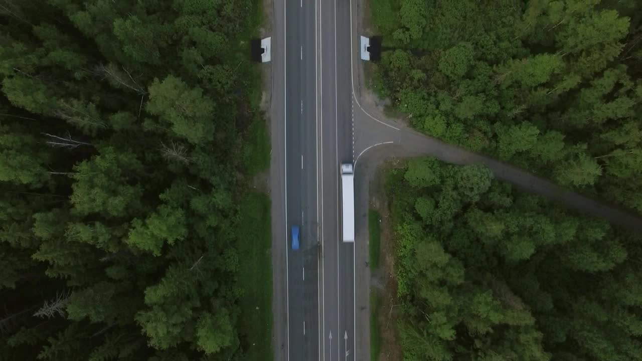Stock Video Freight Trucks Heading Through A Forest Live Wallpaper For PC - Free Download