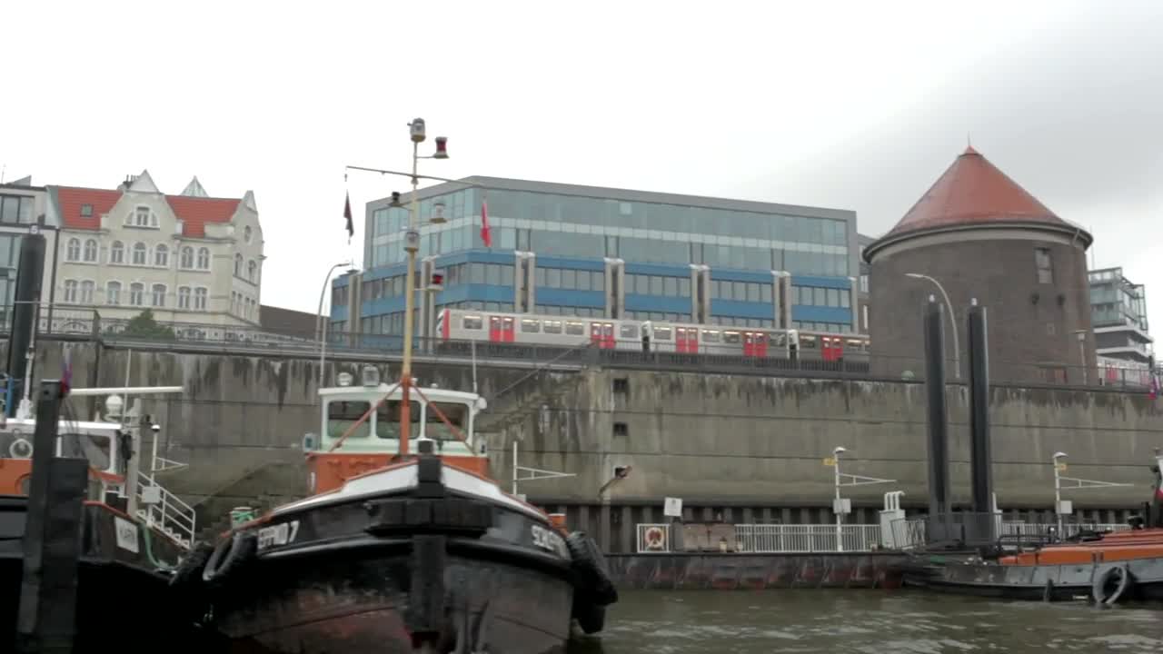 Stock Video Large Boats Docked In A City River Animated Wallpaper - Free Download