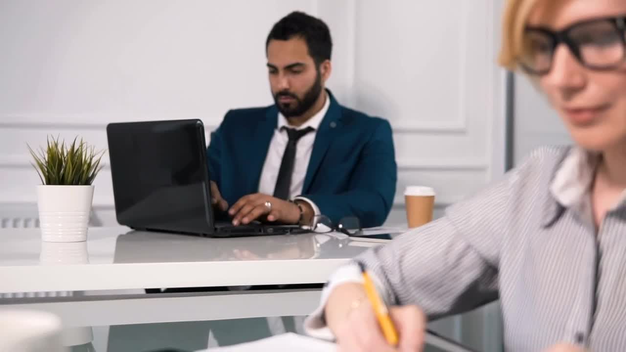 Stock Video Lawyers Working In Modern Office Look Up An Smile Animated Wallpaper - Free Download