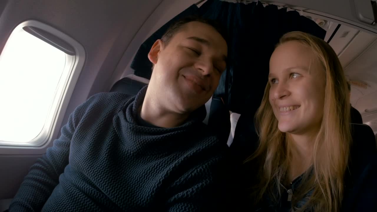 Stock Video Couple Travelling In A Plane Live Wallpaper For PC - Free Download