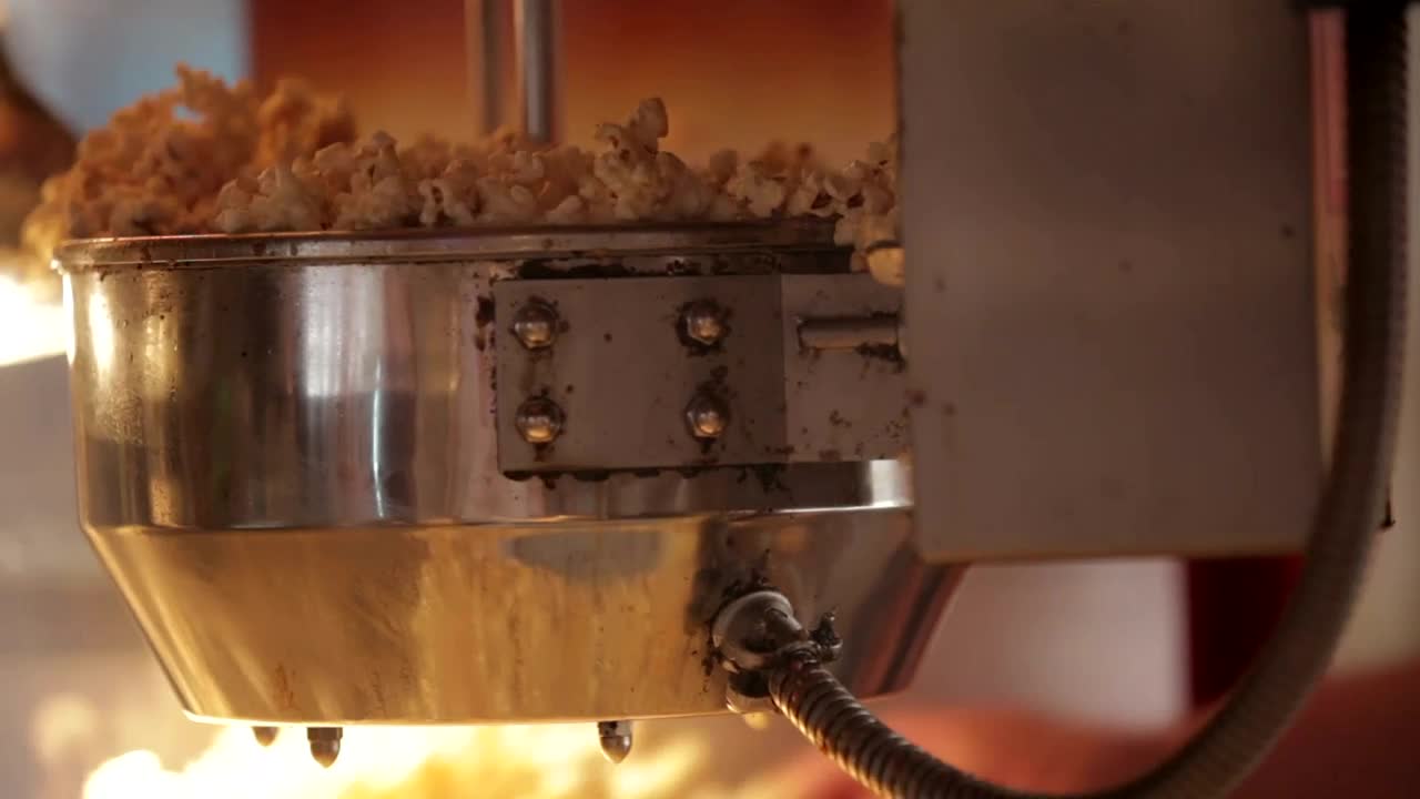 Stock Video Making Popcorn In A Machine Animated Wallpaper - Free Download