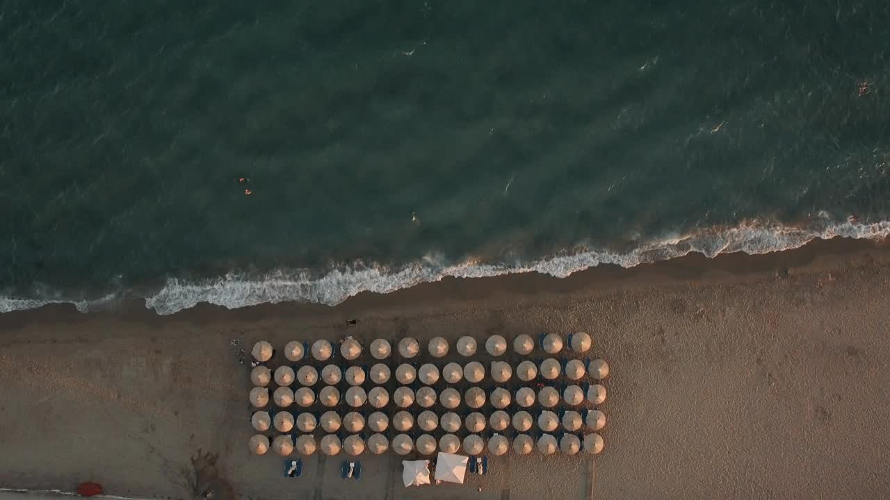 Stock Video Flying Over Straw Umbrellas Live Wallpaper For PC - Free Download