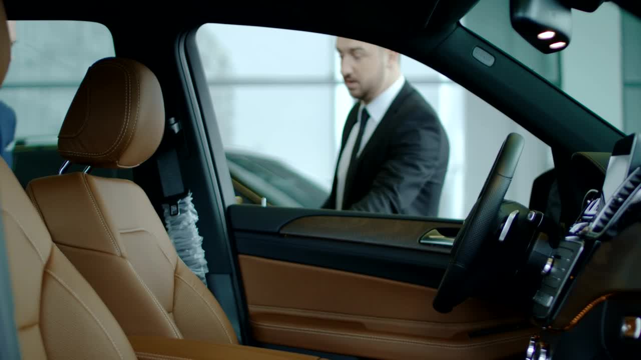 Video Stock Car Dealer Showing The Car To A Client Live Wallpaper For PC - Free Download