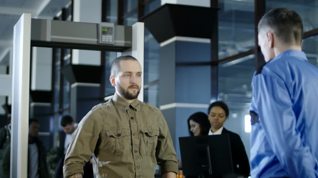Video Stock Checking Passenger With Metal Detector At Airport Live Wallpaper For PC - Free Download