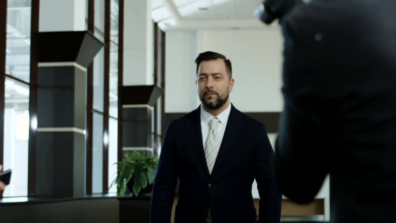 Stock Video Man Refusing Interviews From The Reporter Animated Wallpaper - Free Download