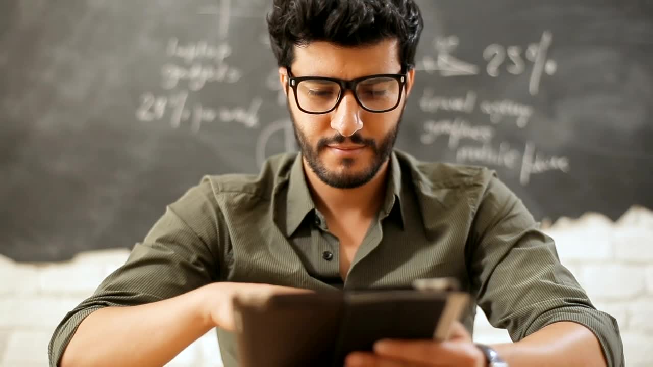 Stock Footage Urban Man Smiling With Tablet In Classroom Live Wallpaper - Free Download