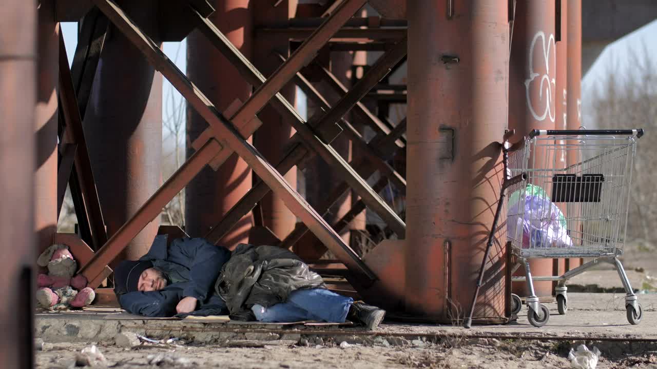 Stock Video Homeless Man Covering Himself Animated Wallpaper - Free Download
