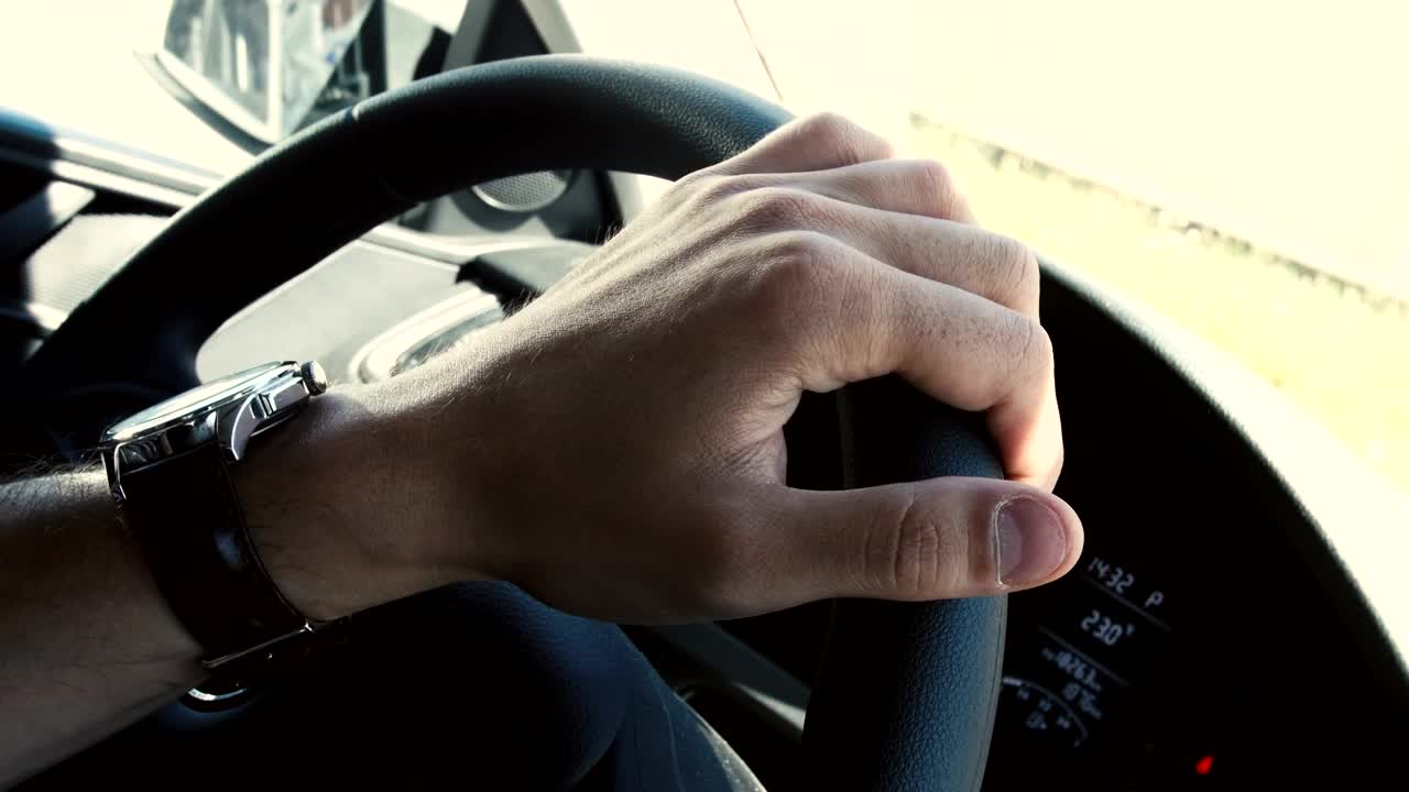 Free Video Stock tapping on a steering wheel Live Wallpaper - Free Download