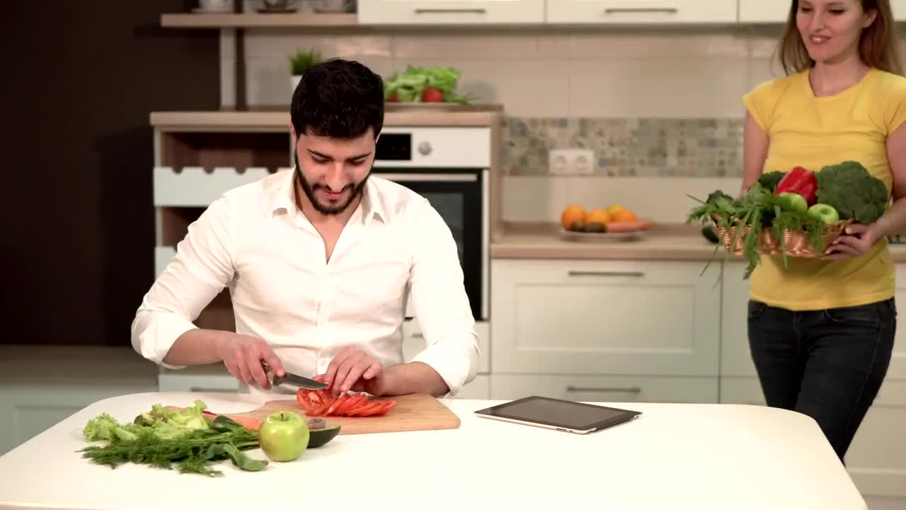 Stock Video Couple Preparing Dinner With Fresh Groceries Live Wallpaper For PC - Free Download
