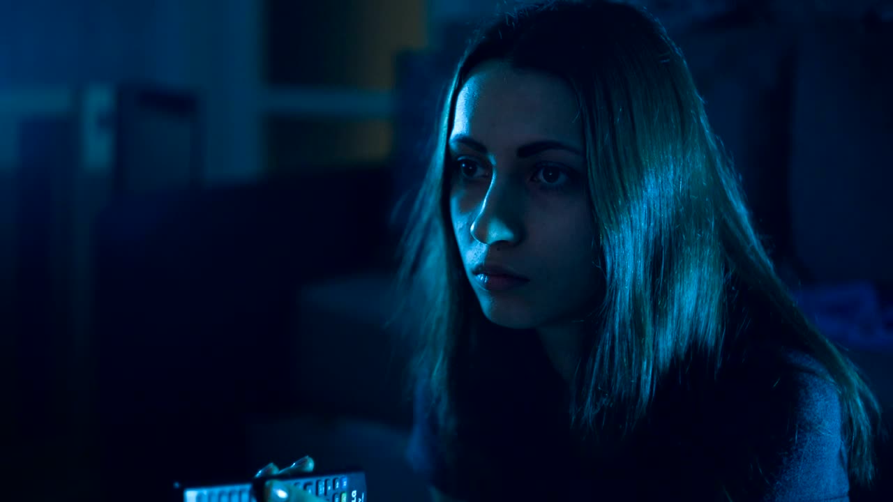 Stock Video Girl In The Dark Changing Channels On Her Tv Live Wallpaper For PC - Free Download