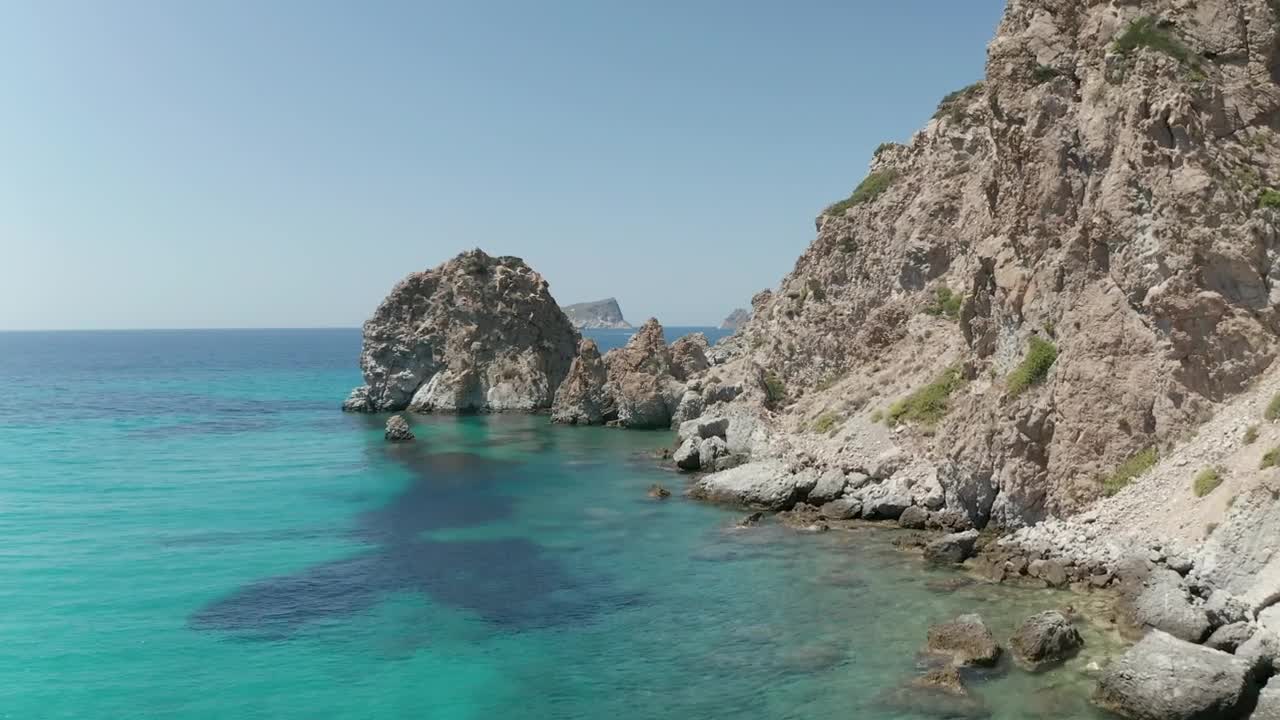 Stock Video Flying On The Rocky Shore Of A Turquoise Blue Sea Live Wallpaper For PC - Free Download