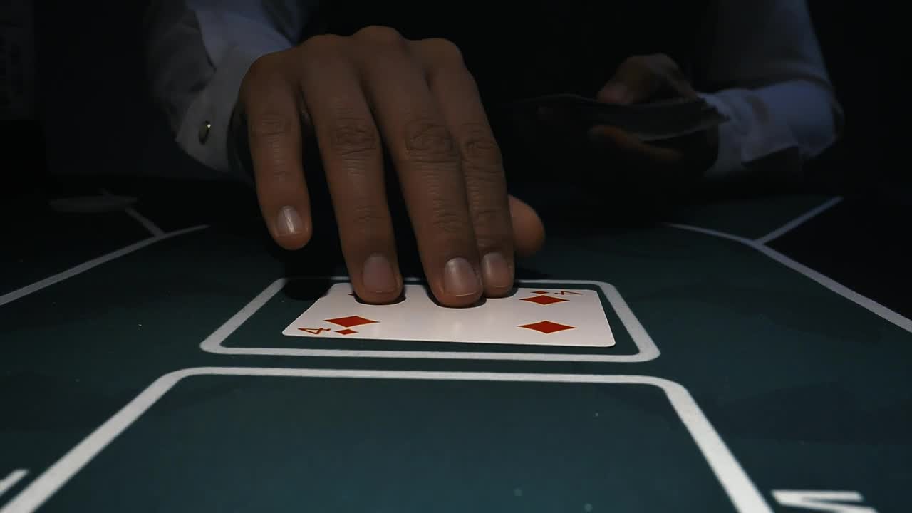 Stock Video Dealer Placing Poker Cards On A Gaming Table Live Wallpaper For PC - Free Download