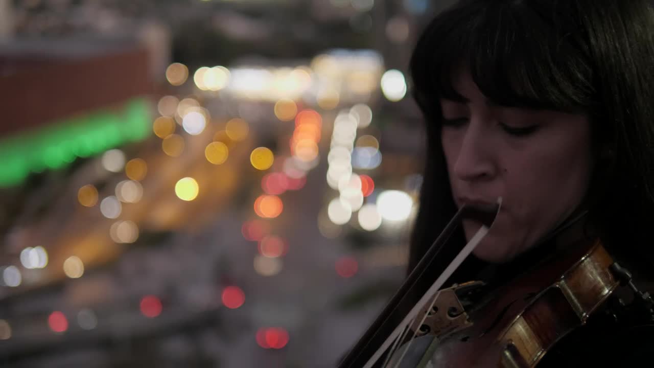 Stock Footage Violinist Playing On City Rooftop At Dusk Live Wallpaper - Free Download