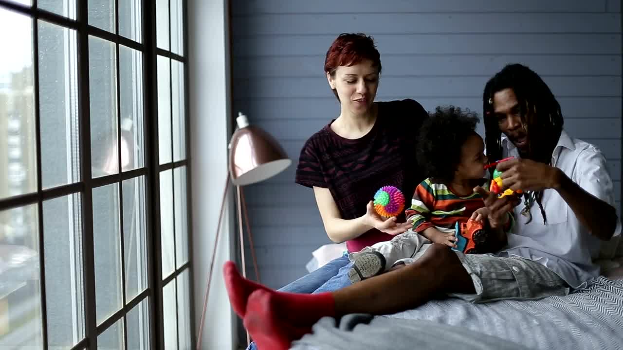 Free Stock Video Young Parents Playing With Their Little Son Live Wallpaper - Free Download