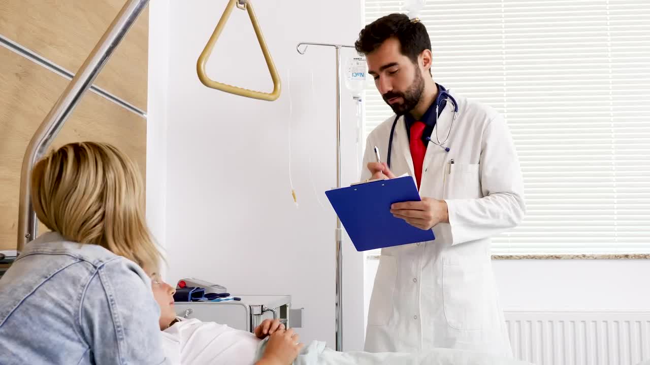Video Stock Child In Hospital Smiles At Doctor Holding Clipboard Live Wallpaper For PC - Free Download