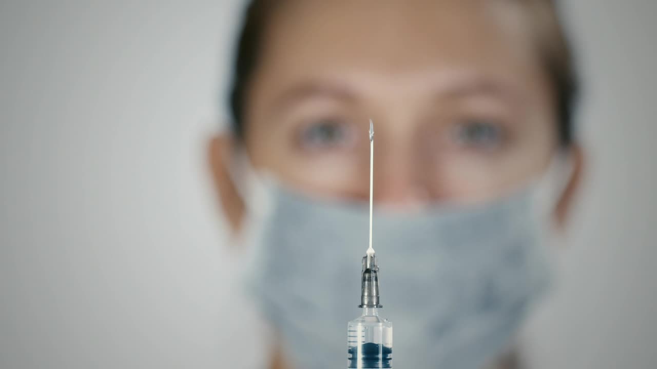 Video Stock Preparing A Vaccine Syringe Live Wallpaper Free - Free Download