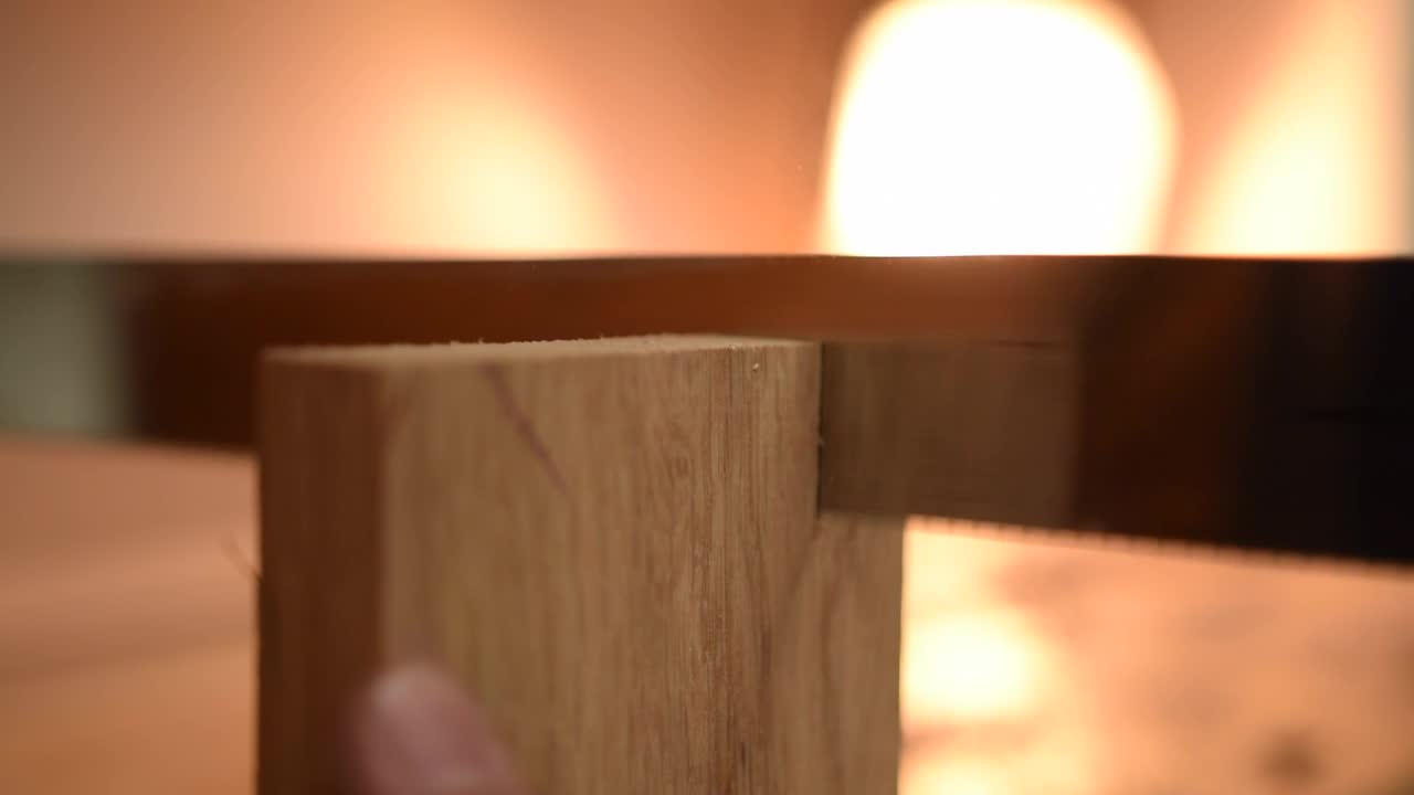 Video Stock Carpenter Sawing A Piece Of Wood Close Up Live Wallpaper For PC - Free Download