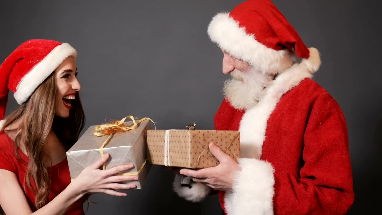 Stock Video Instagram Photoshoot Santa Claus And His Female Helper Animated Wallpaper - Free Download