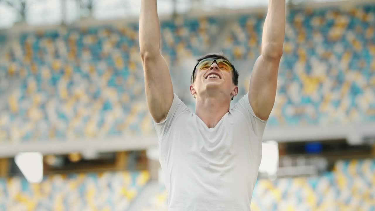 Free Video Stock Sports Race Winner Raises Hands In Victory Live Wallpaper - Free Download