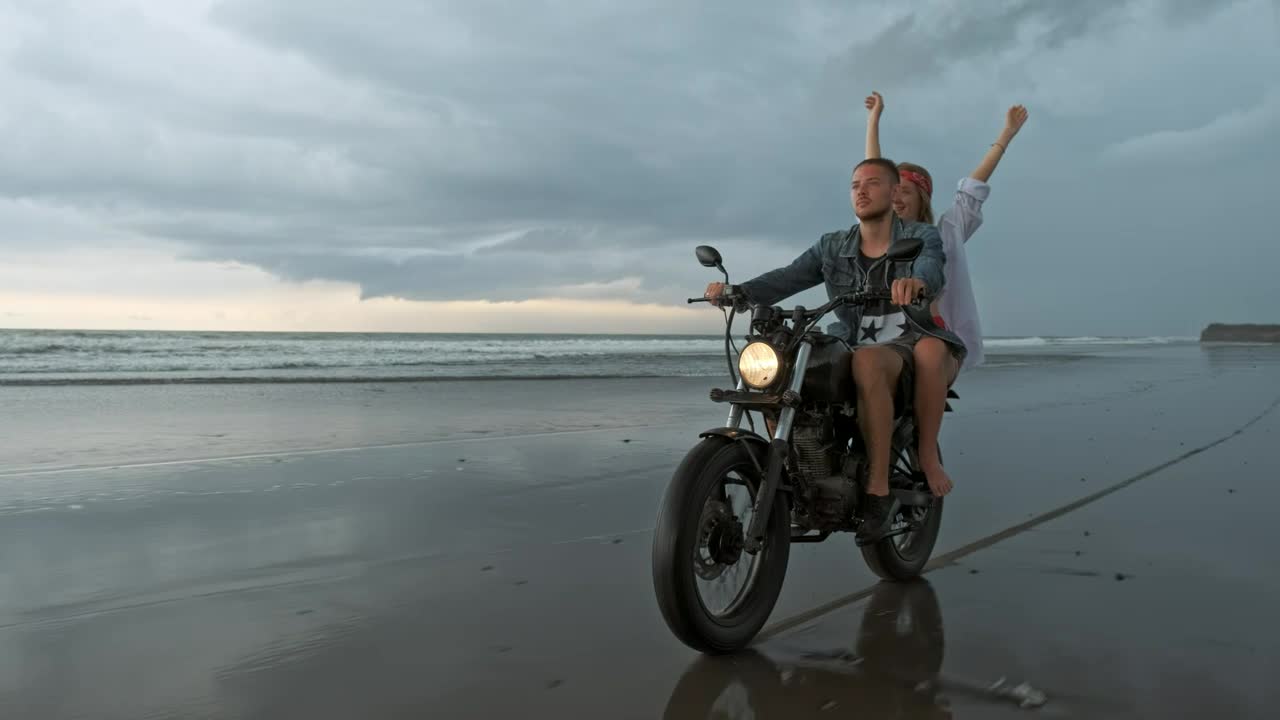 Stock Video Couple Touring A Beach Riding A Motorcycle Live Wallpaper For PC - Free Download