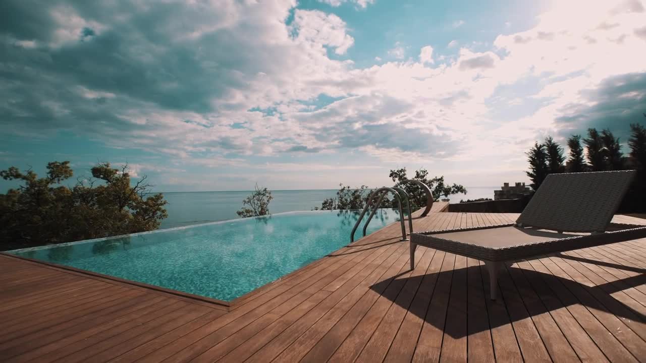 Stock Video Infinity Pool And Wooden Deck Animated Wallpaper - Free Download