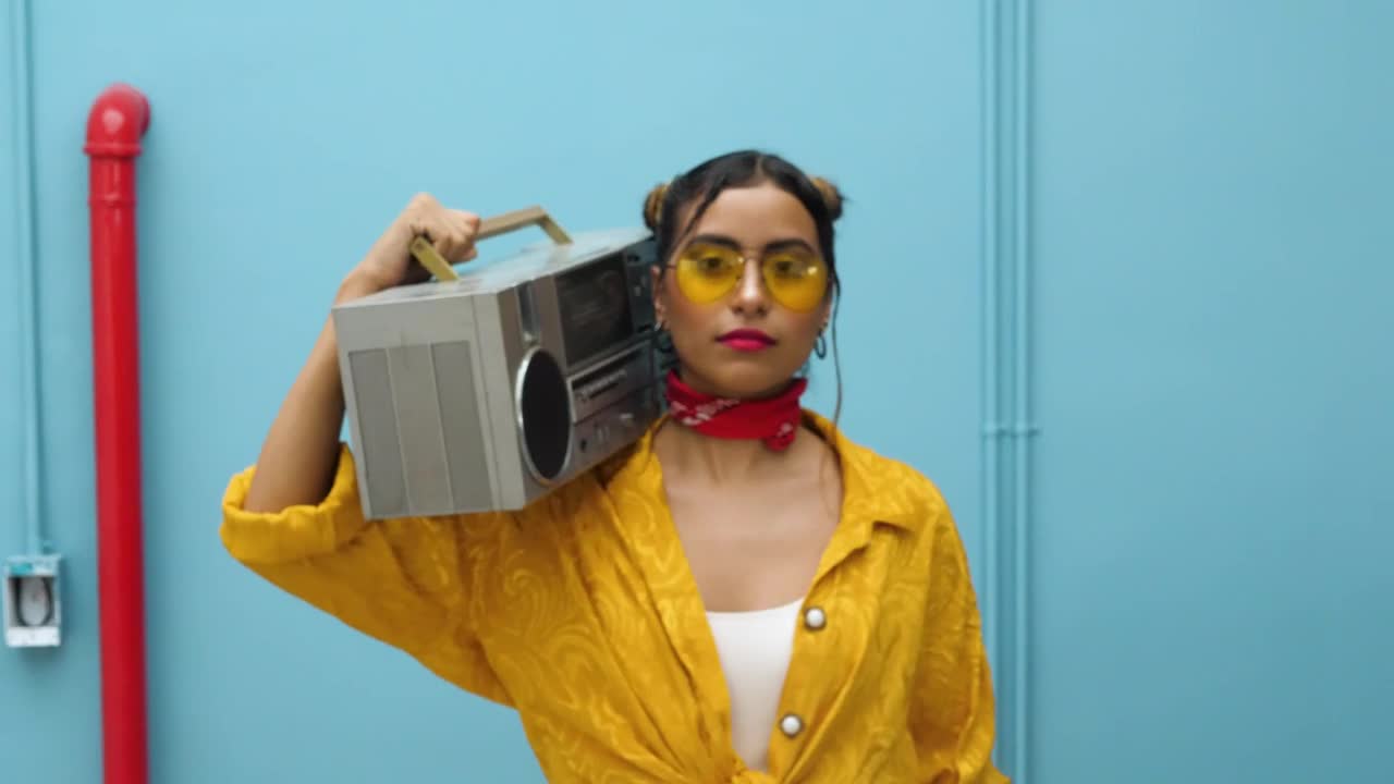 Stock Footage Woman Carrying A Retro Boombox On Her Shoulder Live Wallpaper - Free Download