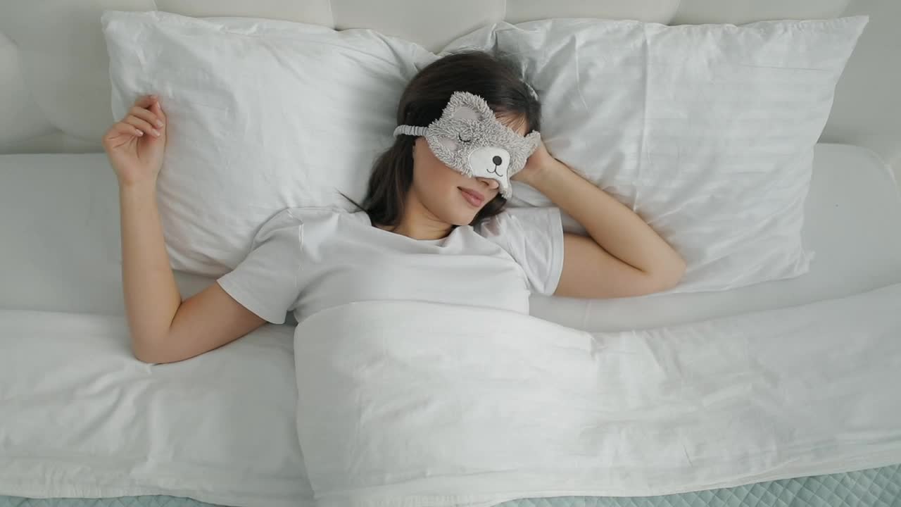 Stock Video Lazy Girl In Animal Mask Sleeps Through Alarm Animated Wallpaper - Free Download