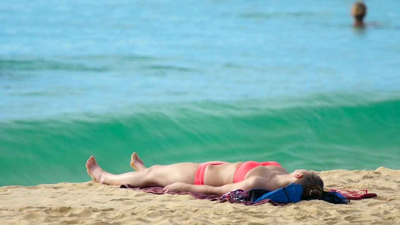 Stock Video Girl In Bikini Laying On The Beach Live Wallpaper For PC - Free Download