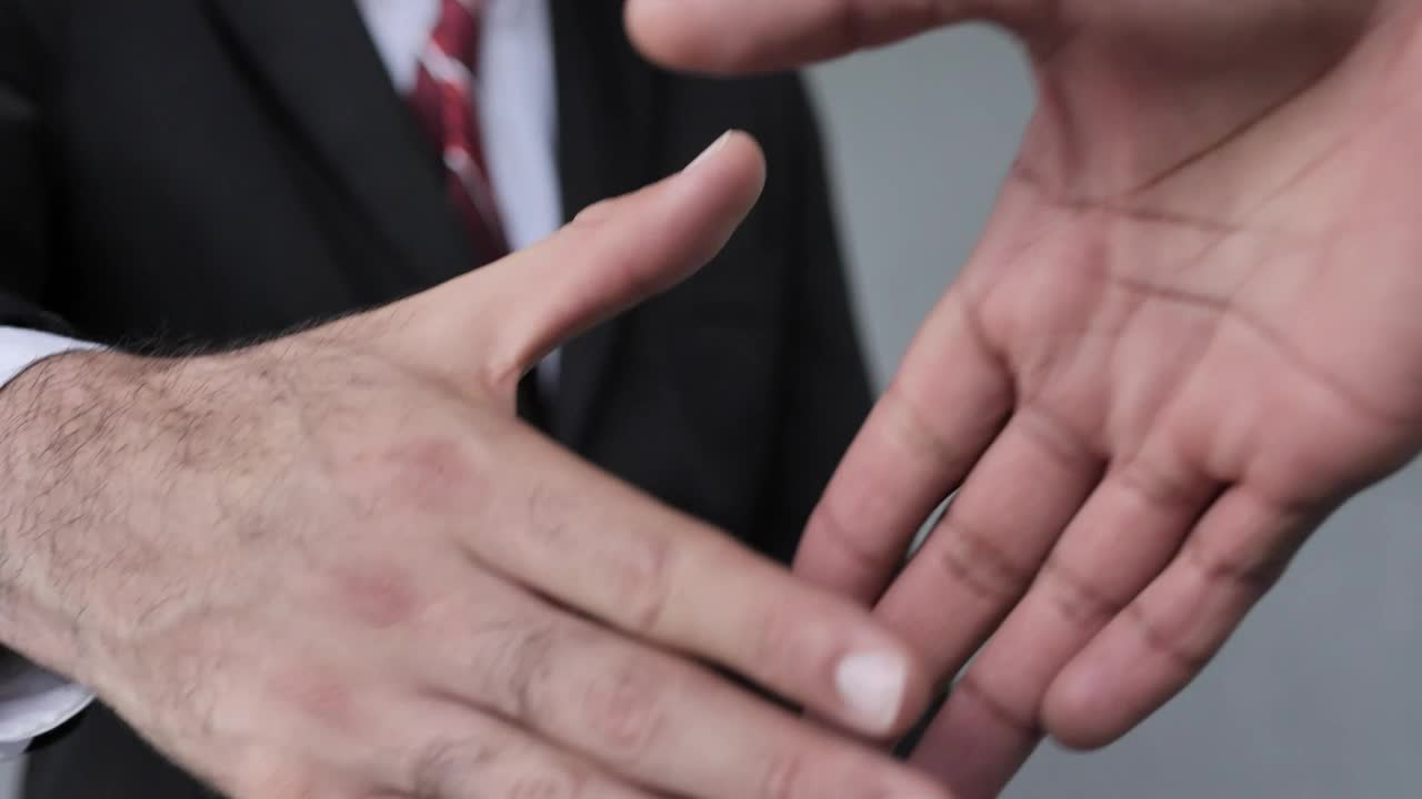 Video Stock Close Up Handshake Between Formal Dressed Men Live Wallpaper For PC - Free Download