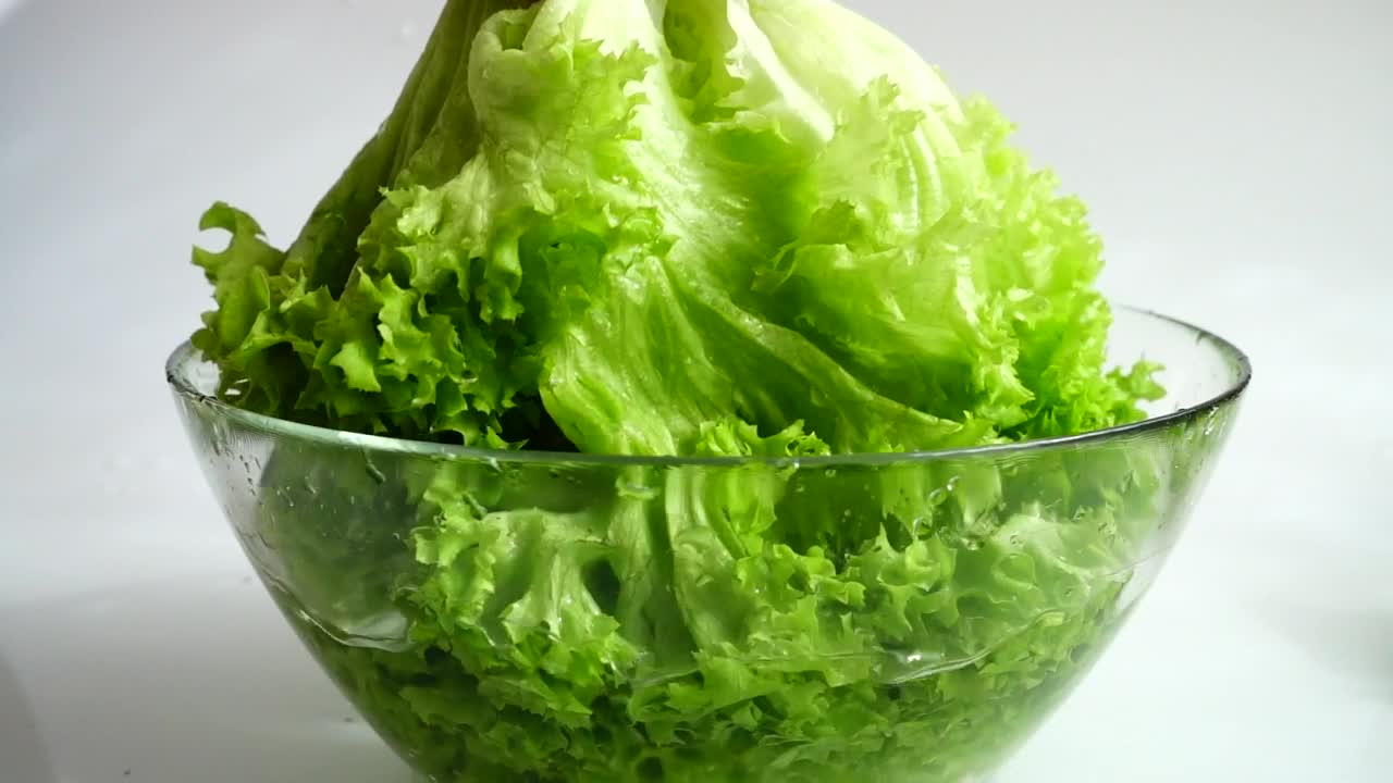 Stock Footage Washing Lettuce Before Making A Salad Live Wallpaper - Free Download
