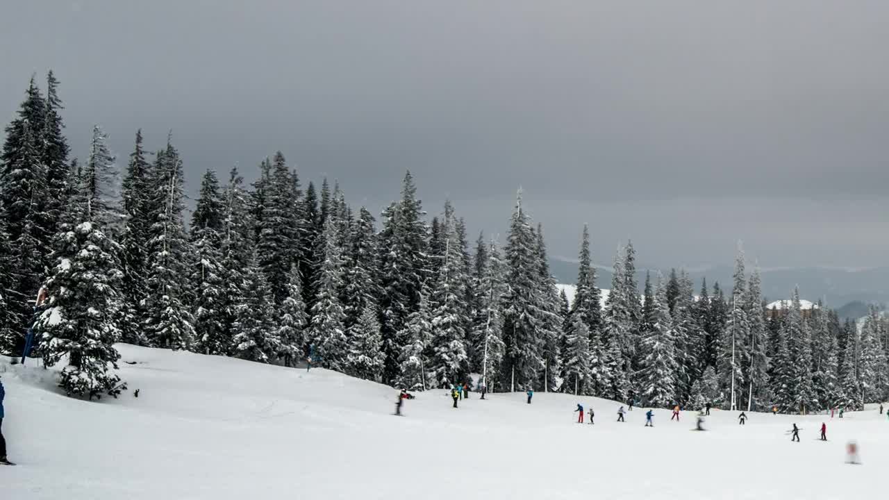 Free Video Stock time lapse of a ski area with tourists practicing Live Wallpaper - Free Download