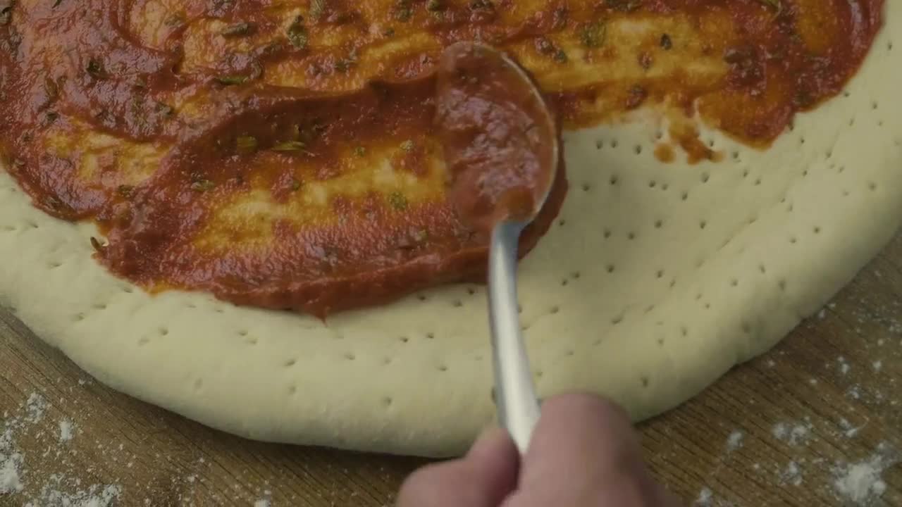 Video Stock Preparing A Pizza Dough Covering It With Salsa Live Wallpaper Free - Free Download