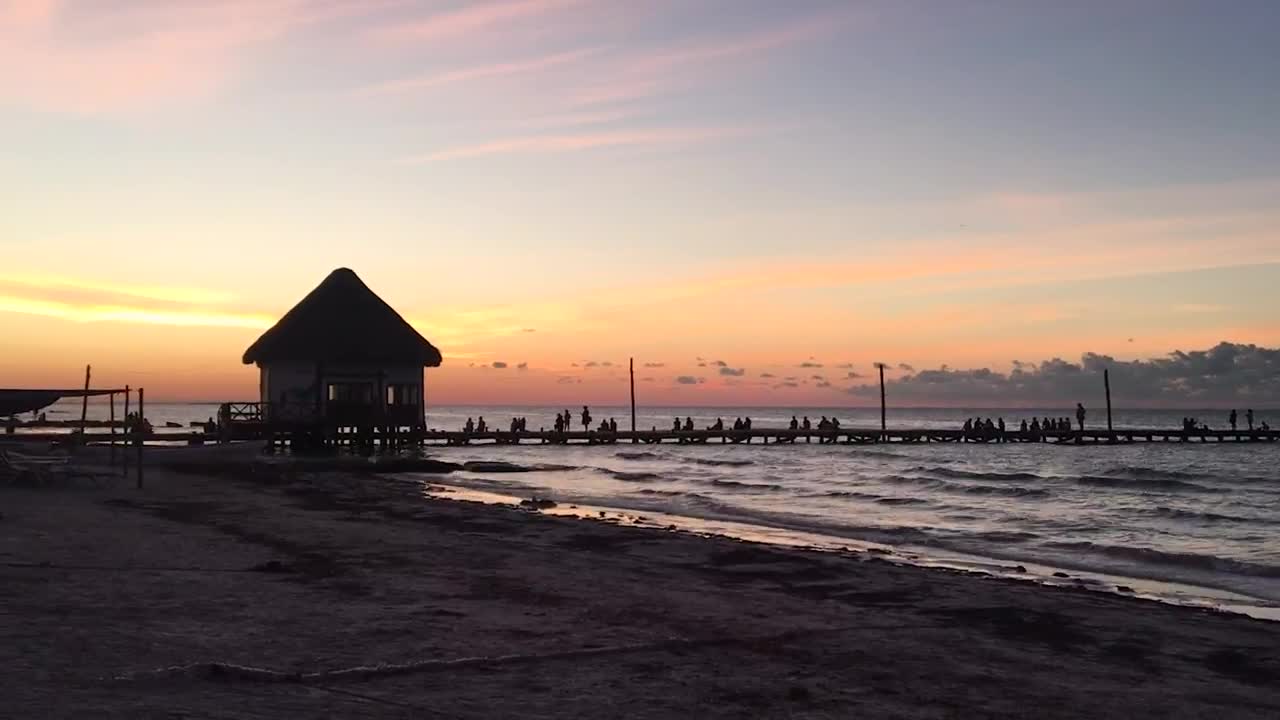 Free Video Stock tourists watching the sunset on a pier Live Wallpaper - Free Download