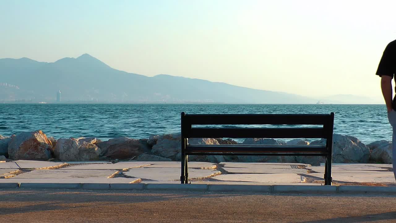Stock Video Man Looking Out To Sea At The Pier From Animated Wallpaper - Free Download