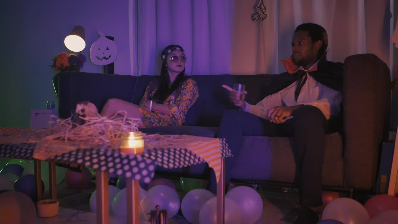 Stock Video Group Of Friends Chatting At A Halloween Costume Gathering Live Wallpaper For PC - Free Download