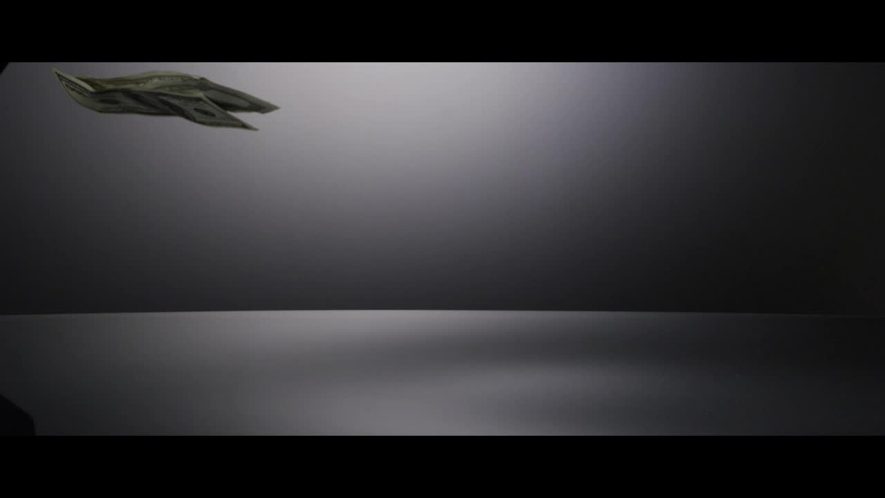 Stock Video Falling Dollars On The Black Table Live Wallpaper For PC - Free Download