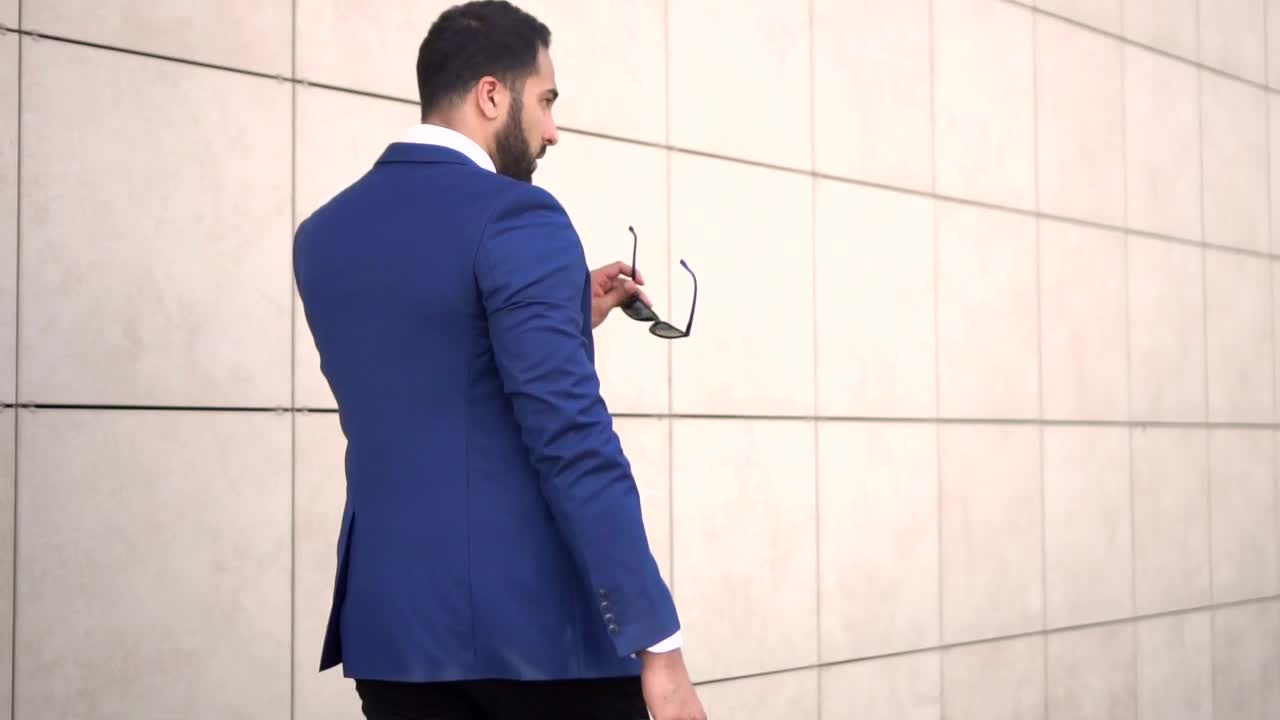 Video Stock Businessman Wearing Sunglasses Walking Live Wallpaper For PC - Free Download