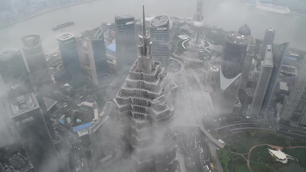 Stock Video Clouds Passing By A Skyscraper In Shanghai Live Wallpaper For PC - Free Download