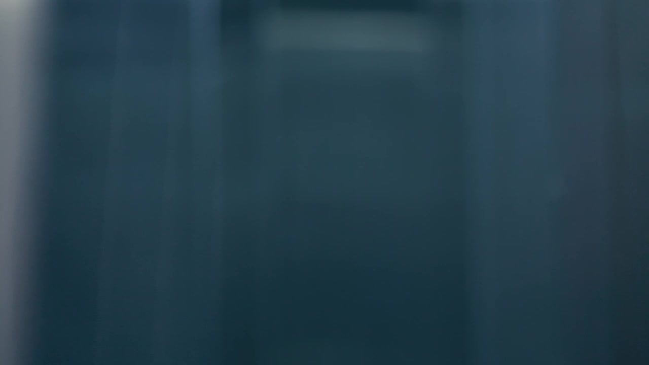 Stock Video Man Entering An Elevator While Talking On The Phone Animated Wallpaper - Free Download