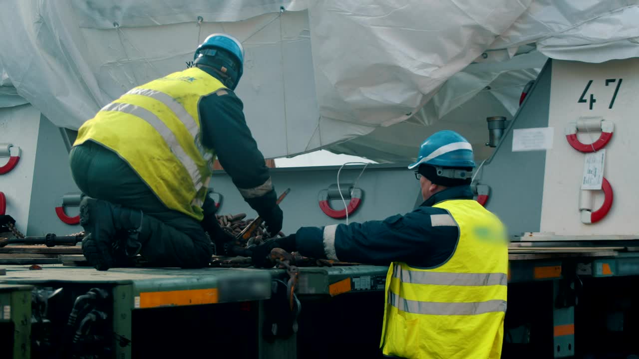 Stock Video Men With Helmet And Vests Workin Animated Wallpaper - Free Download