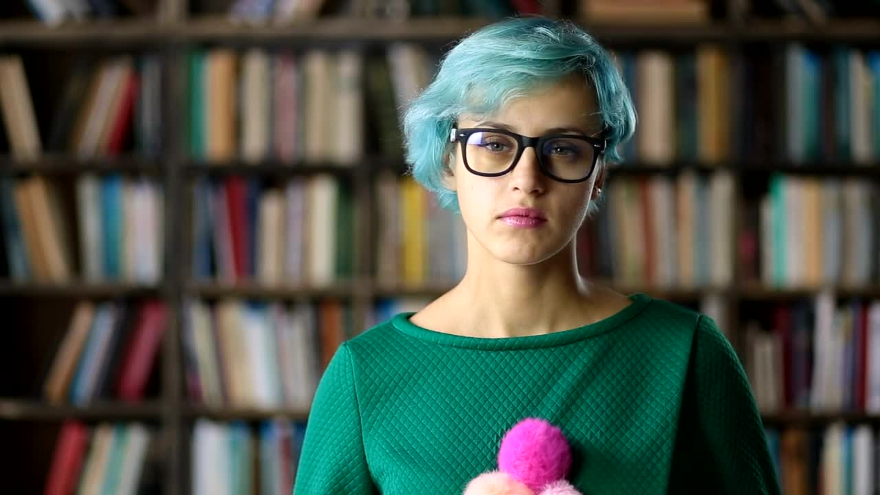 Free Stock Video Young Woman With Glasses In A Library Portrait Live Wallpaper - Free Download