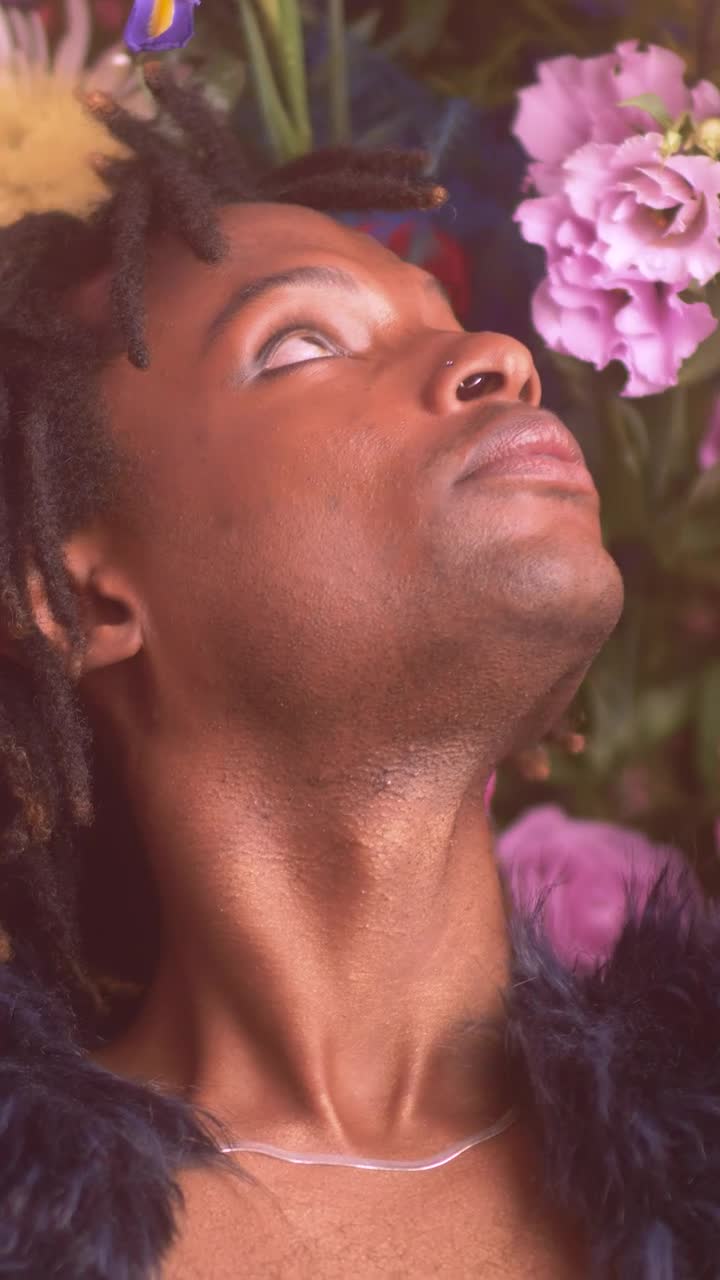 Stock Video Face Of An Lgbtq Boy Surrounded By Flowers Live Wallpaper For PC - Free Download