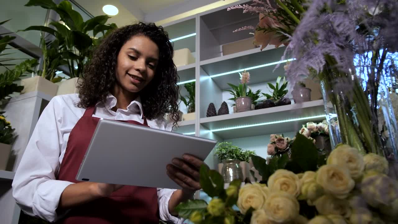 Stock Video Florist Smiling As She Works In Her Store Live Wallpaper For PC - Free Download