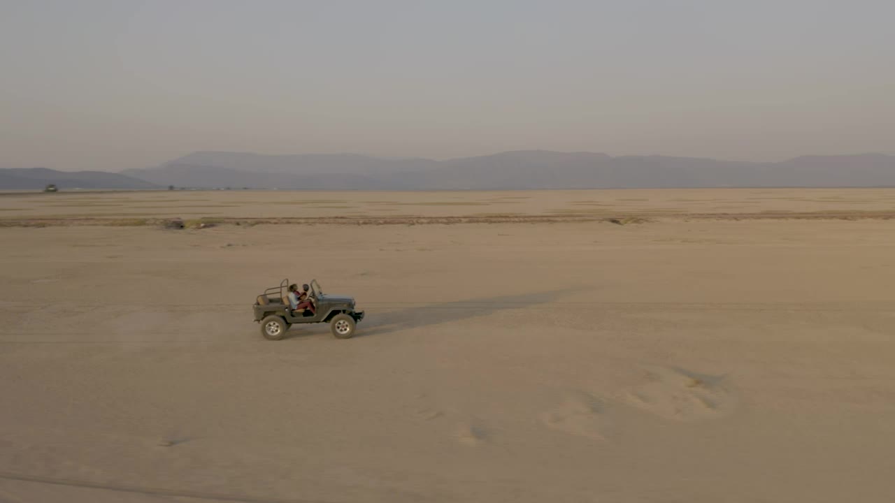 Stock Video Crossing A Desert By Truck At Sunset Live Wallpaper For PC - Free Download