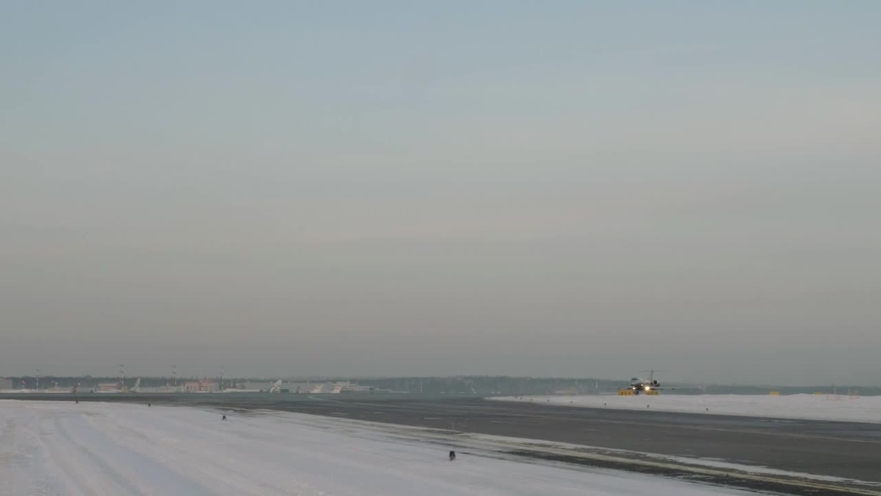 Free Video Stock taking off from a snowy airfield Live Wallpaper - Free Download
